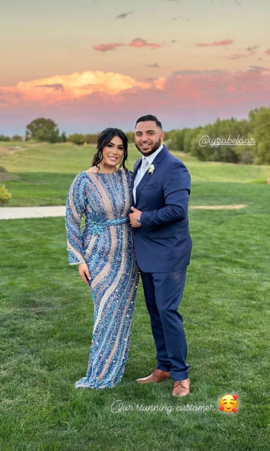 Mariam Long Sleeve Beaded Dress (Blue) worn outdoors, long sleeves, fitted maxi style.