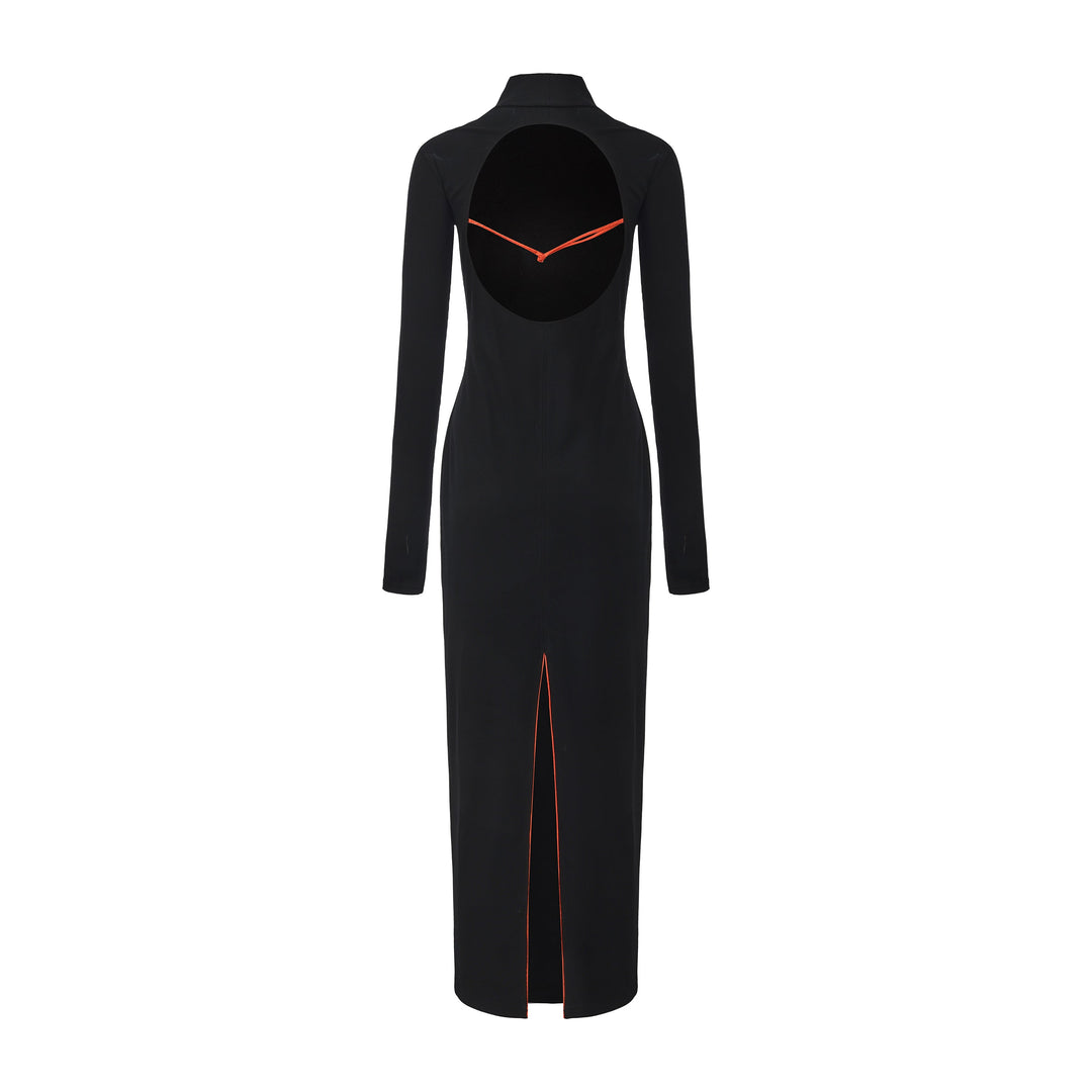 Black maxi dress, open back with orange-trim straps; side slit at hem