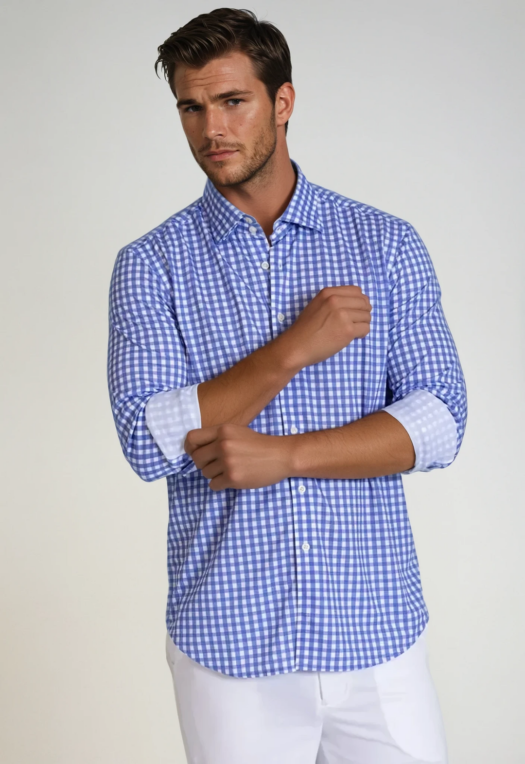 Blue gingham button-up dress shirt on model, front view, long sleeves