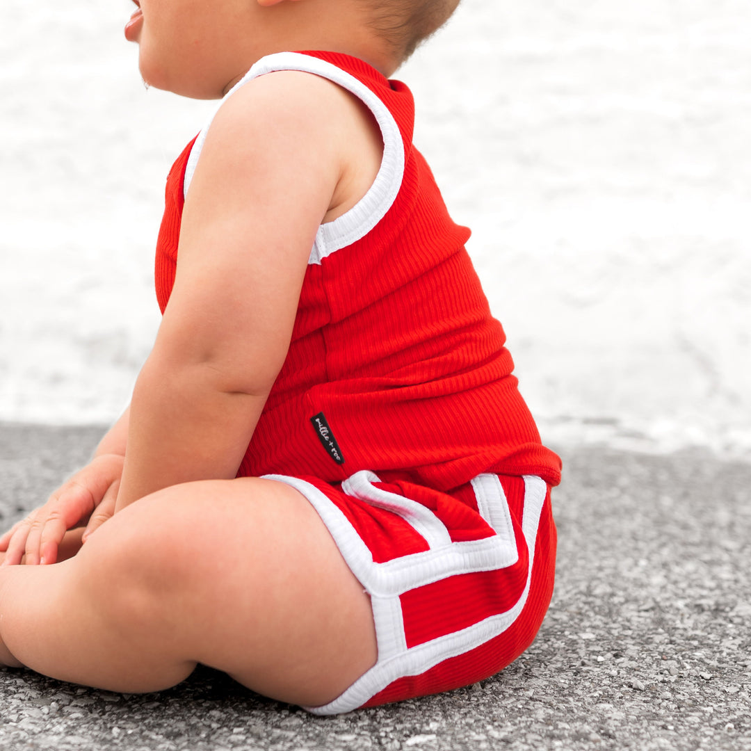 Red ribbed tank and shorts set with contrast white piping and drawcord hem detail