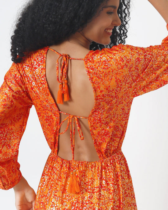 Morocco Dress open back with tie bow straps; orange patterned fabric, V-cut