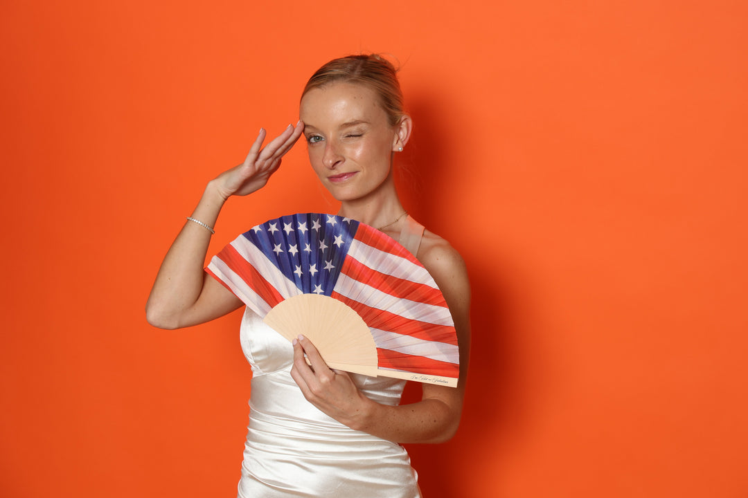 US star-and-stripe hand fan held in hand