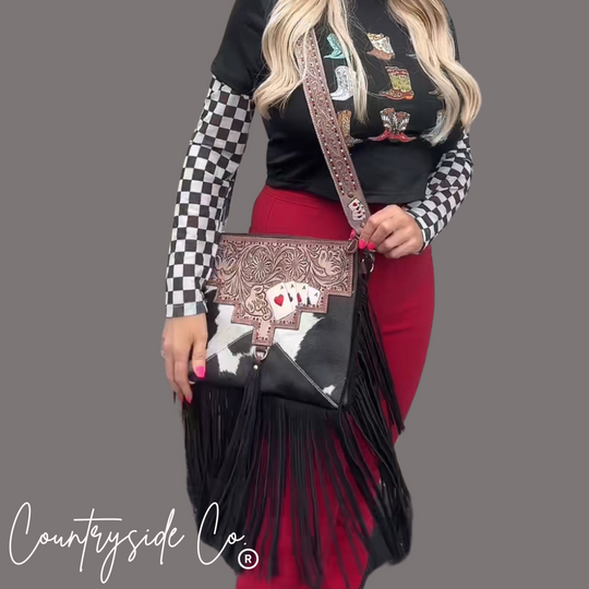 Cowhide gambler fringe purse with playing-card ace patch and long black fringe