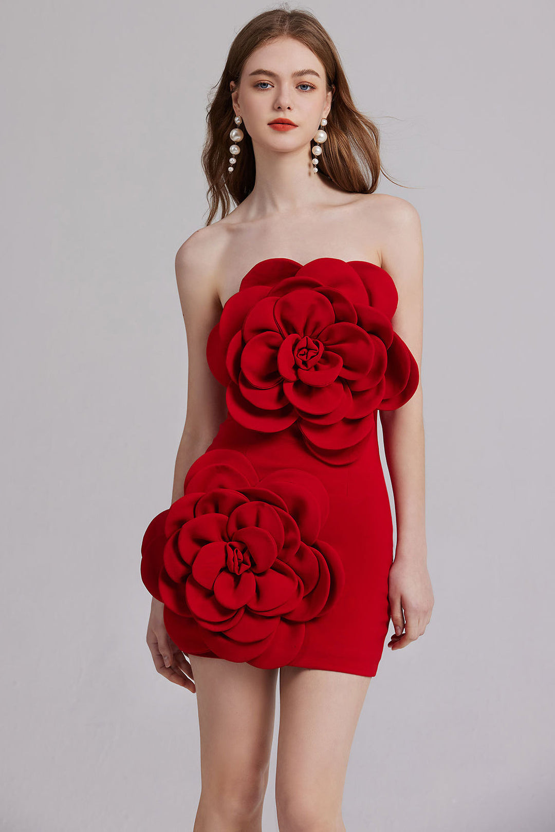 Red strapless mini dress with 3D flower appliqué on bodice
