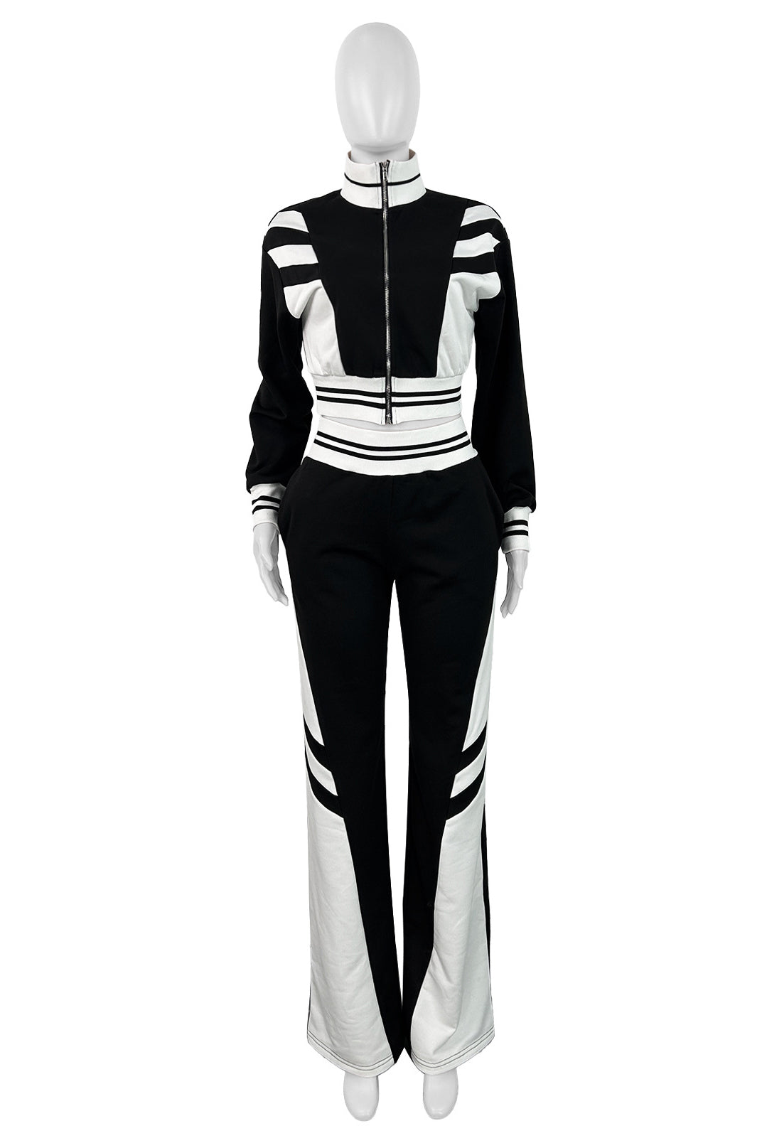 Front view: hooded zip jacket and flared pants in black with white stripes