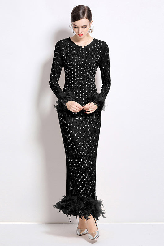 Black sequin long-sleeve maxi dress with feather cuffs and scalloped hem detail
