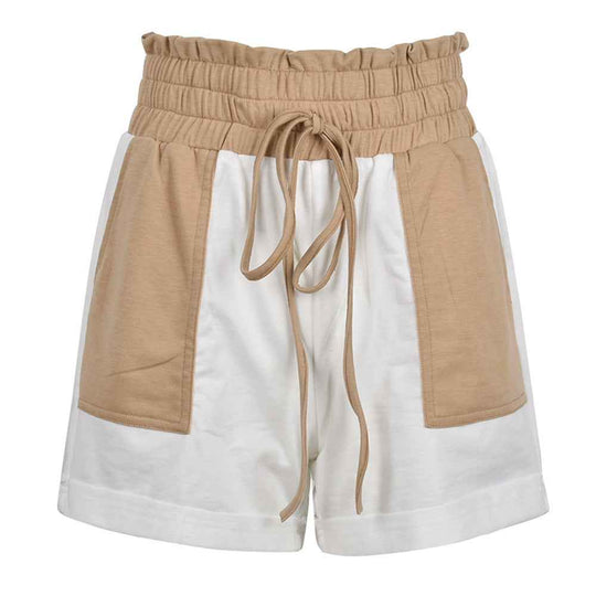 Two-tone beige and white shorts with elastic waist and center drawstring ties