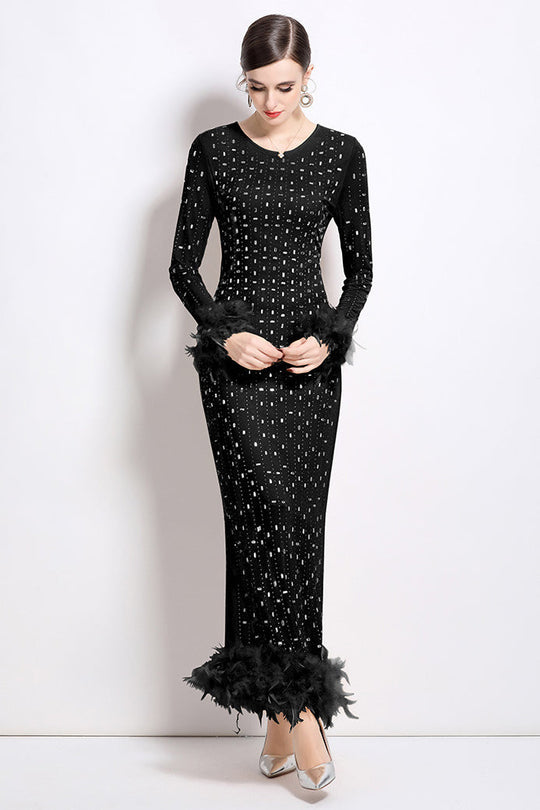 Black long-sleeve maxi party dress with sequin dots and feather cuff and hem