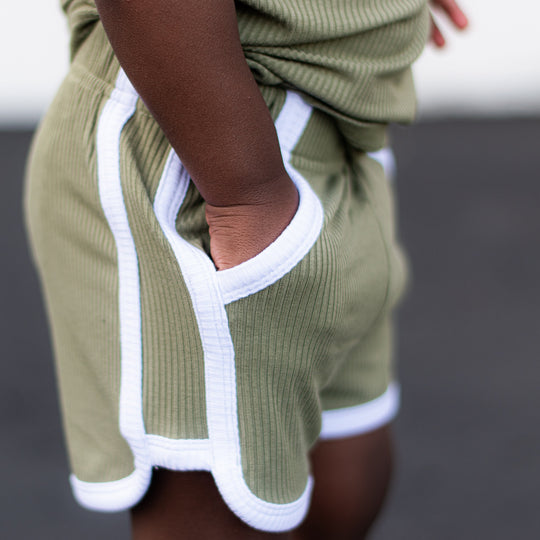 Sage track shorts with white drawstring tie and contrast rib trim