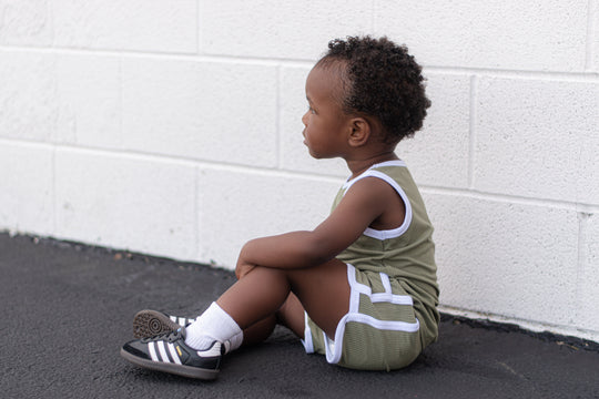 Sage track set with white-edged tank and shorts, ribbed knit