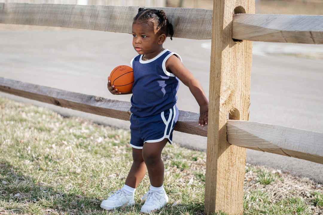 Navy track shorts set with white trim, sleeveless top and matching shorts