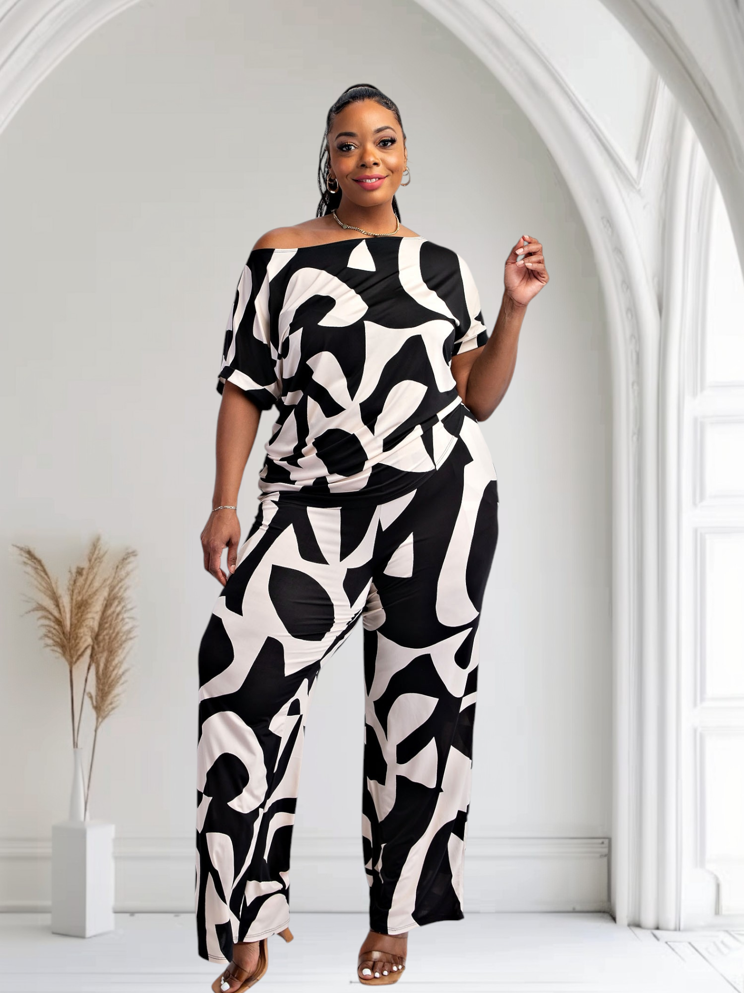 Lori print plus-size pants set, black with white abstract shapes, front view