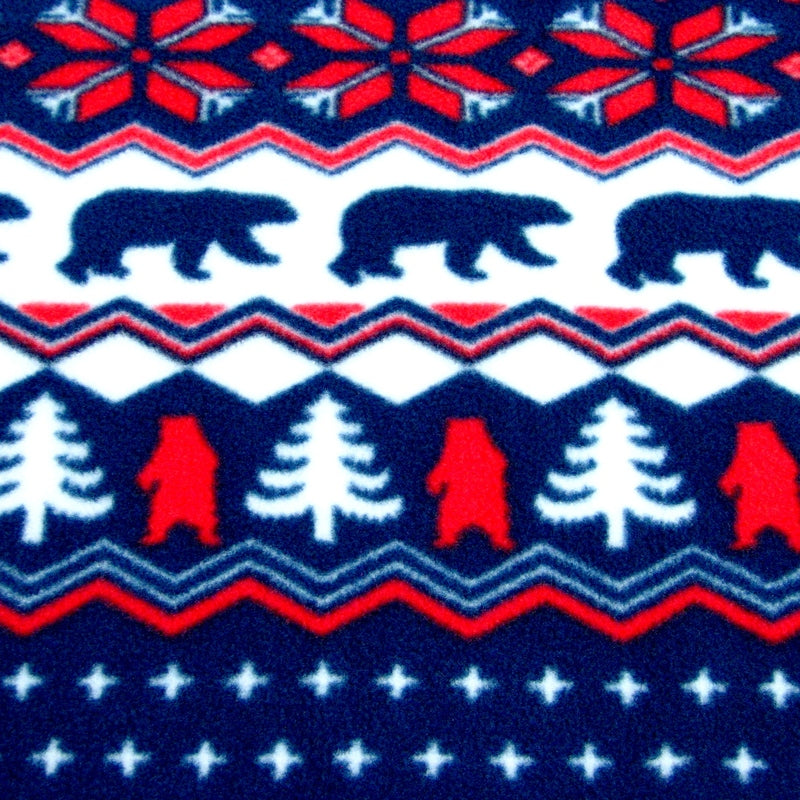 Navy fleece sock fabric close-up with polar bears, trees, red accents, and stars