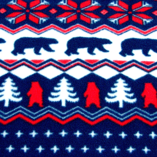 Navy fleece sock fabric close-up with polar bears, trees, red accents, and stars