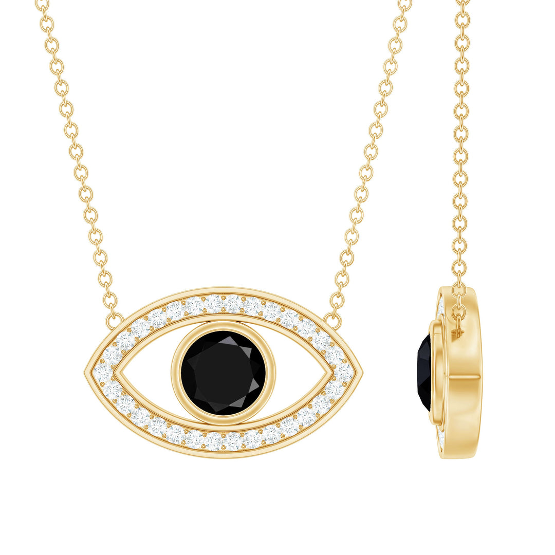 Gold-toned evil eye necklace with oval black stone and white diamond halo, chain links