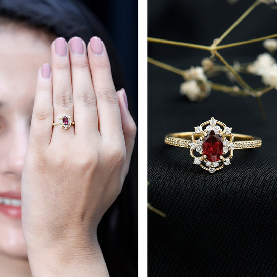 Rhodolite oval center ring on hand, gold-toned band with diamond side stones