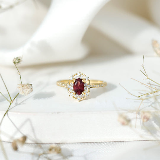 Oval rhodolite diamond halo ring, gold-toned band with pave accents