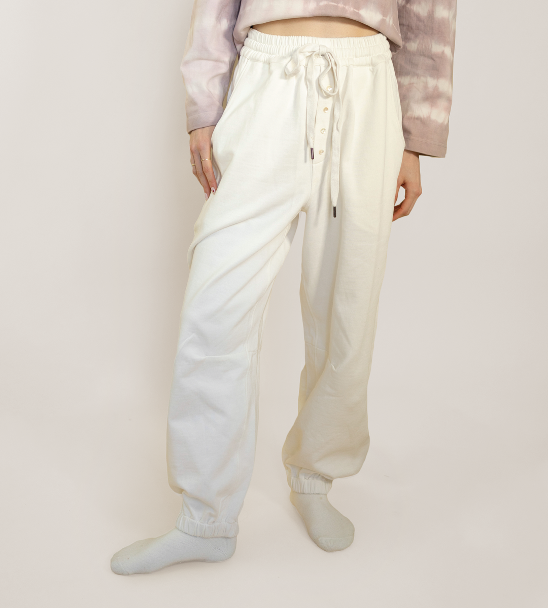 Harmony lounge pants in off-white with drawstring waist and button front placket