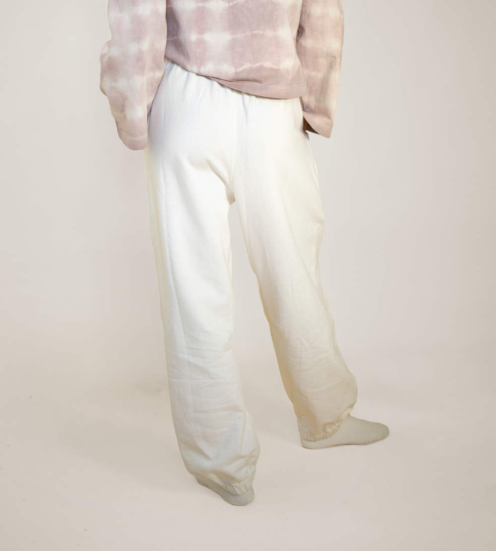 Off-white Harmony lounge pants, side view with elastic cuffs and relaxed jogger fit