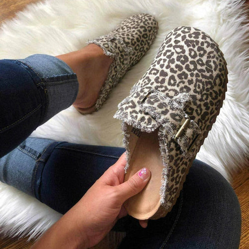 Leopard print vintage canvas loafer with round toe and flat sole, slip-on with buckle strap
