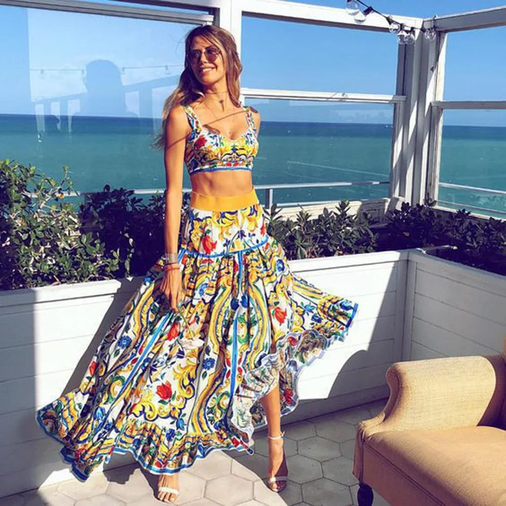 Colorful crop camisole paired with A-line maxi skirt, bold floral scroll print, full skirt flare