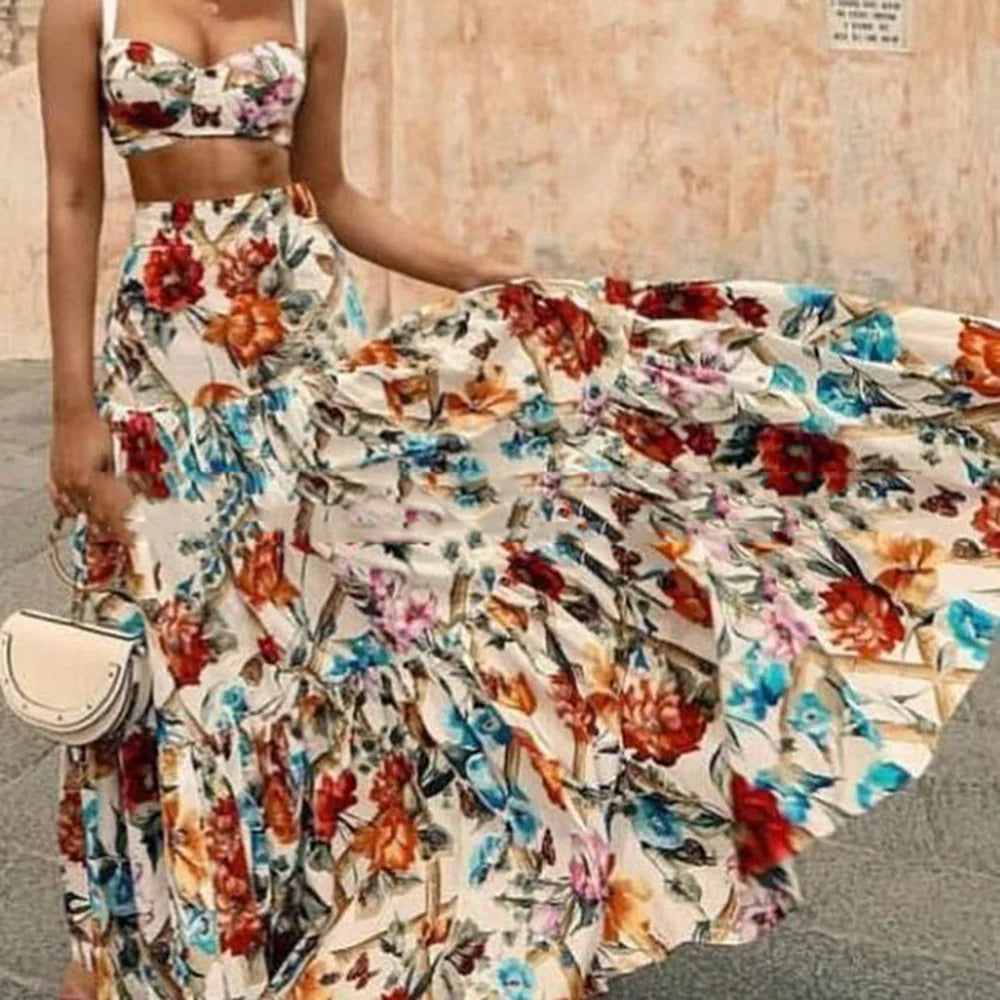 Printed crop camisole and flowy A-line maxi skirt set with bright floral pattern, white base