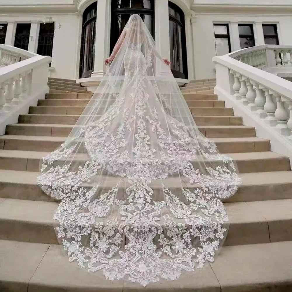Royal bridal veil with lace appliqués and sparkling sequins, long soft tulle drape