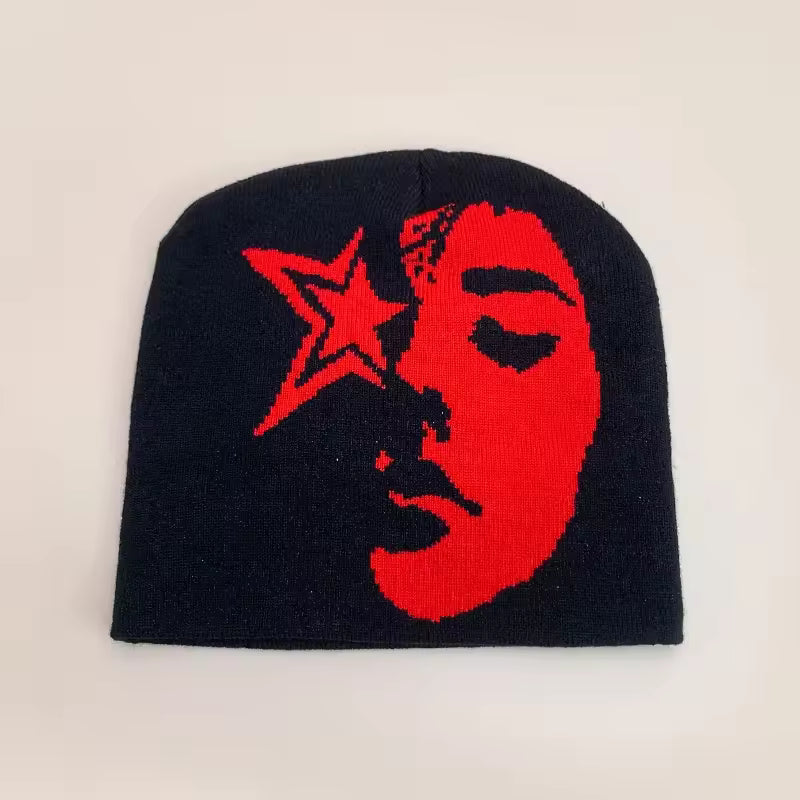 Black beanie with moon and star graphic, red face print, ribbed knit cuff