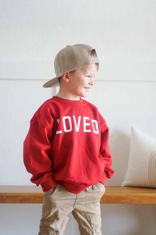 Red crewneck sweatshirt with &