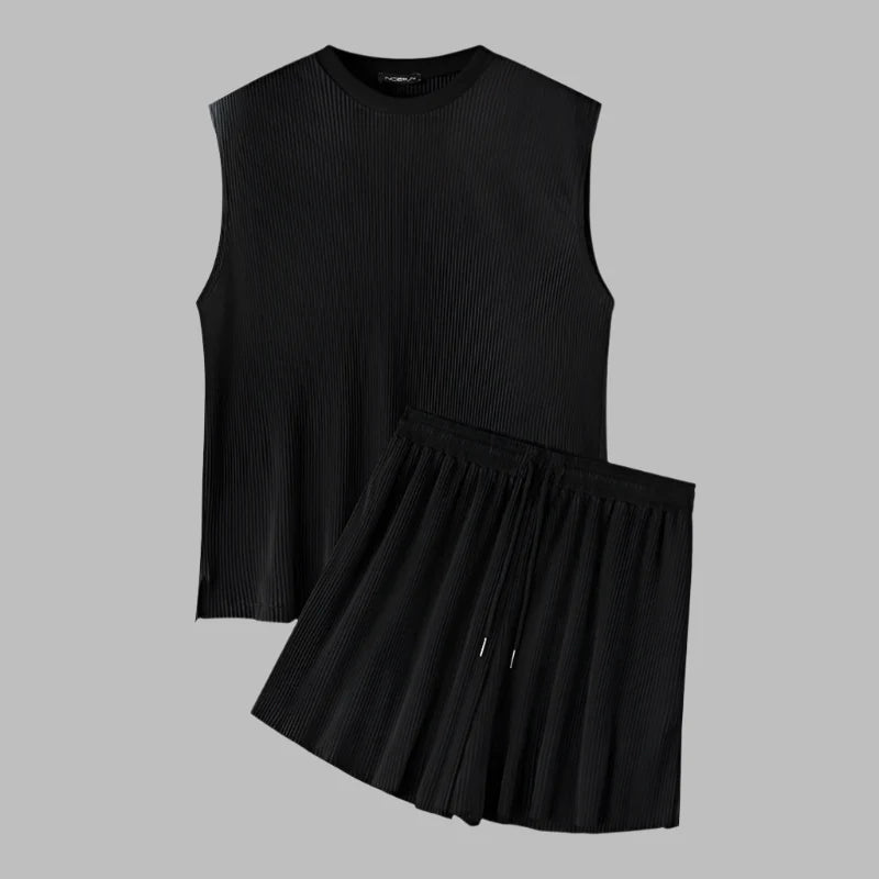 Black sleeveless ribbed tank with pleated drawstring shorts set (flat lay)