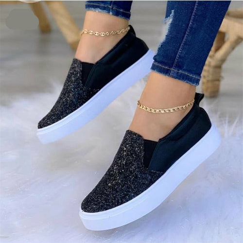 Black glitter flat moccasin loafers with gold chain ankle strap and white sole