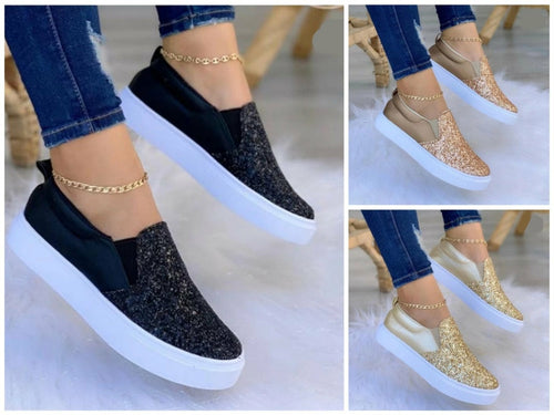 Pair of glitter moccasin loafers: black and gold, both with gold chain straps