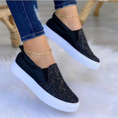 Glitter flat moccasin loafers in black with gold chain ankle strap