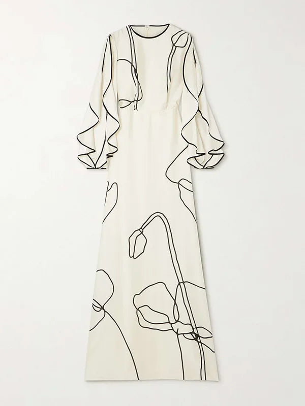 White evening dress with black floral line print, long sleeves and straight cut
