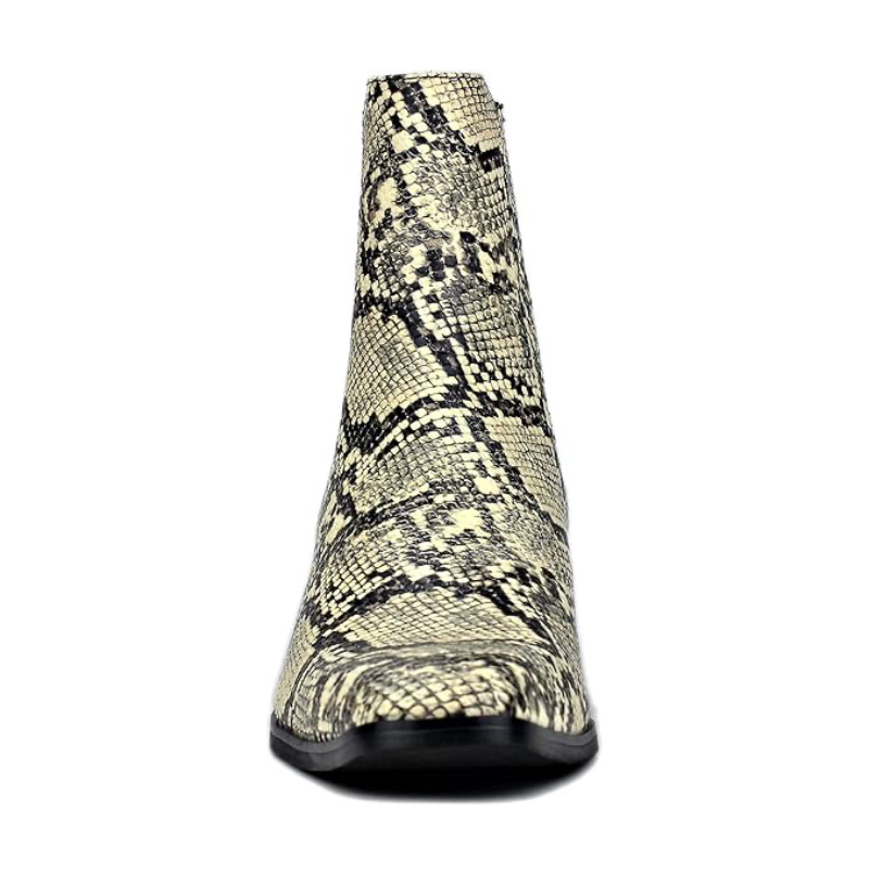 Beige chelsea boot with snake-skin texture, black sole edge and pull-on shaft