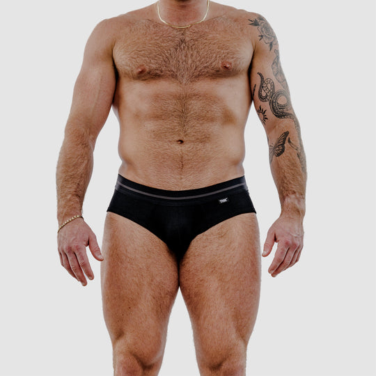 Black standard brief underwear with contrasting gray-striped waistband