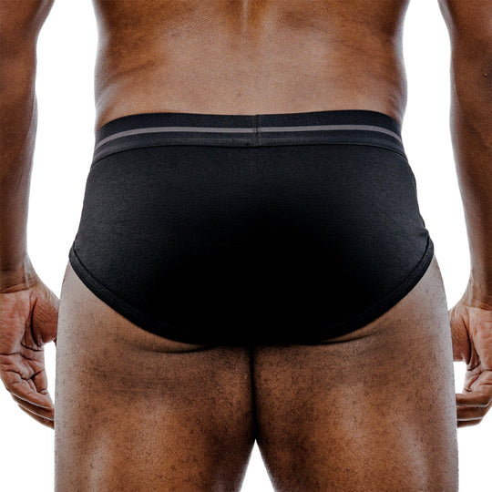 Black brief back close-up showing gray-striped waistband and curved leg openings