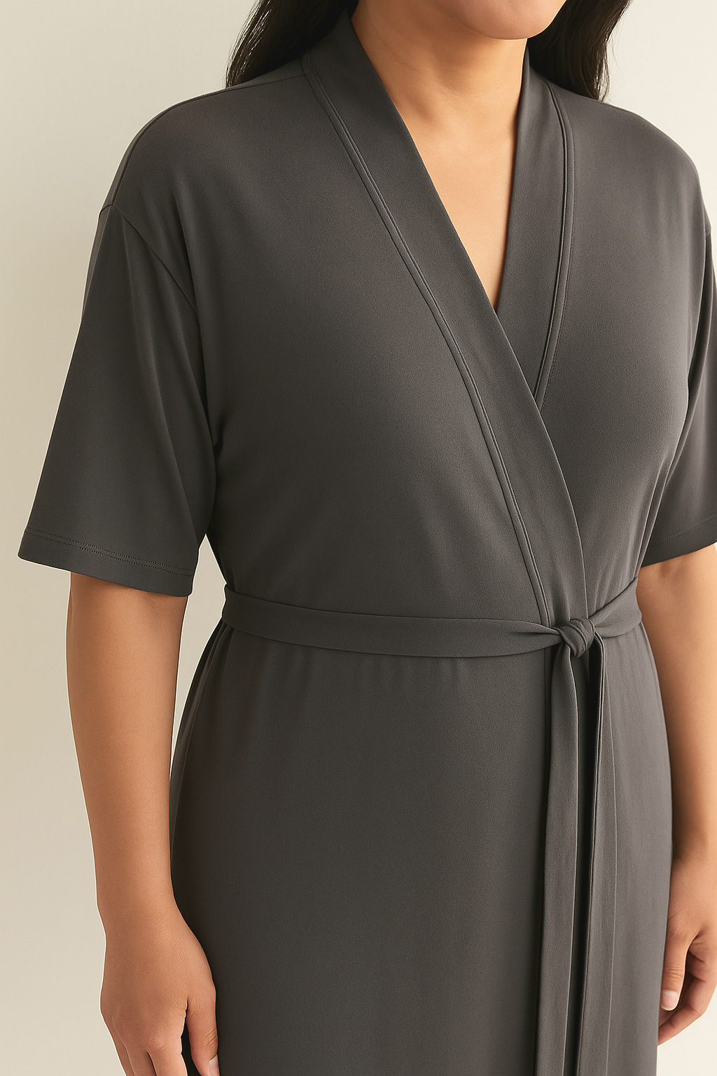 Dark gray robe close-up: V-neck and tie belt at waist