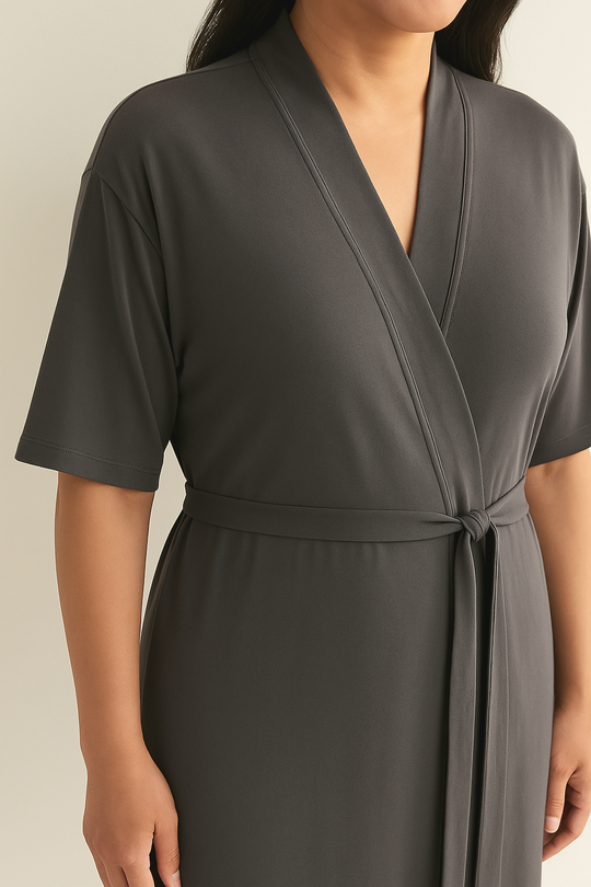 Dark gray robe close-up: V-neck and tie belt at waist