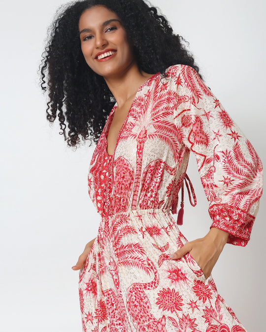 V-neck printed maxi dress with gathered bodice, long sleeves and tie details