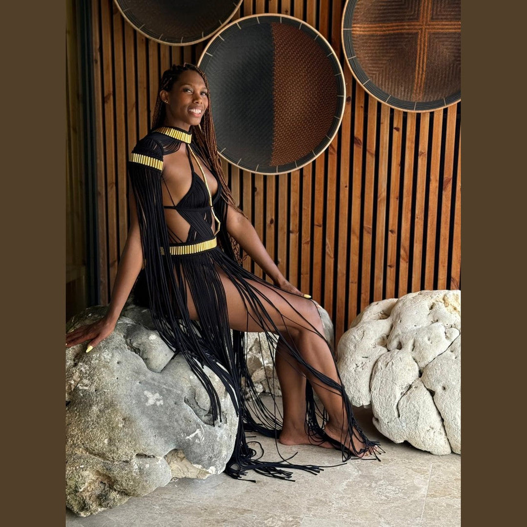 Grecian Elegance Calypso dress in black with gold trim, strappy neckline and long fringe