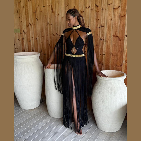 Grecian Elegance Calypso dress in black with gold trim, fringe overlay, open back