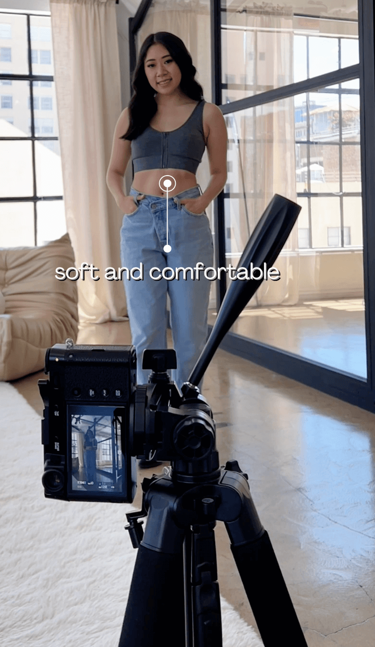 Grey cotton bralette front view with center seam and zipper placket