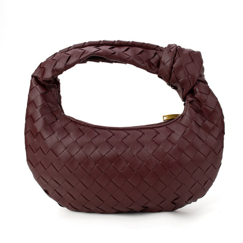 Knotted woven handbag in cranberry, braided knot handle, woven pattern