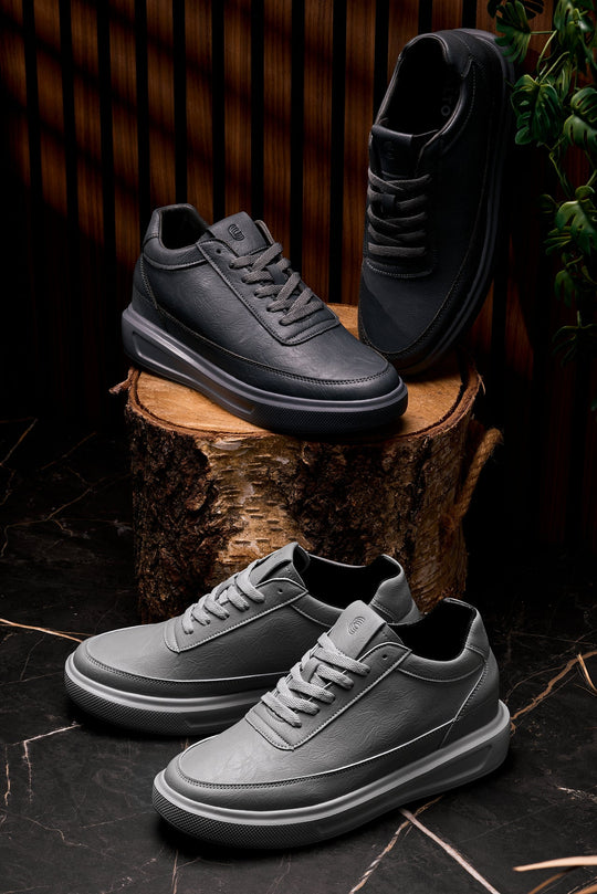 Iron grey lace-up sneakers with thick sole and side logo detail