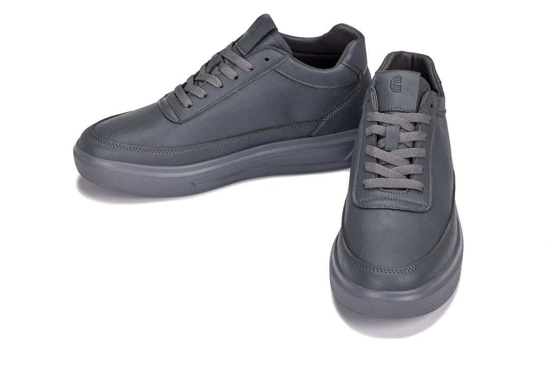 Iron grey sneakers, lace-up front with padded heel and platform-style sole