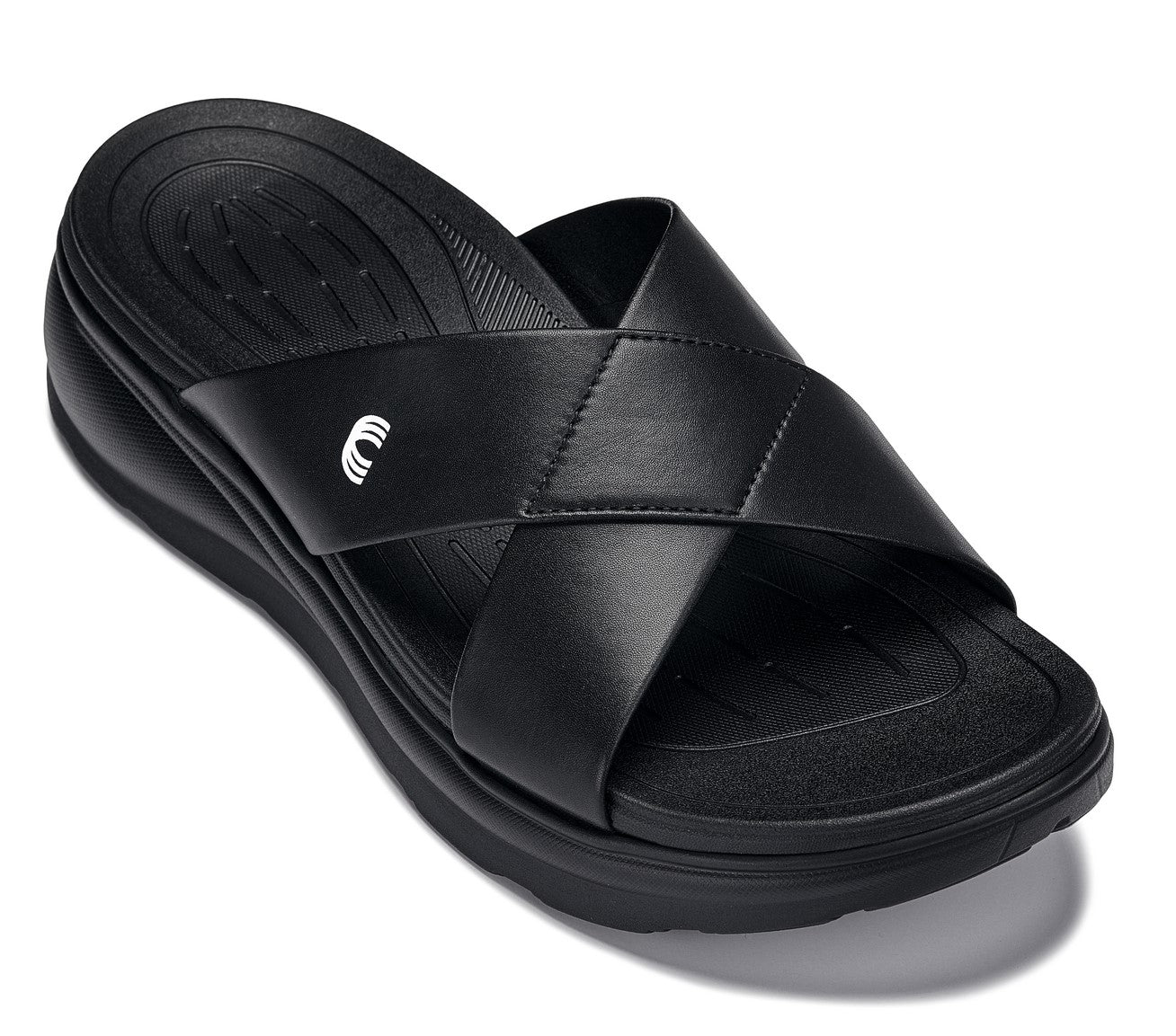 Black matte slide sandals with cushioned footbed, double-cross straps, and platform sole.