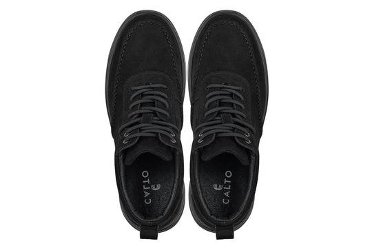 Black lace-up sneaker boots, front view with rounded moc toe and eyelet laces