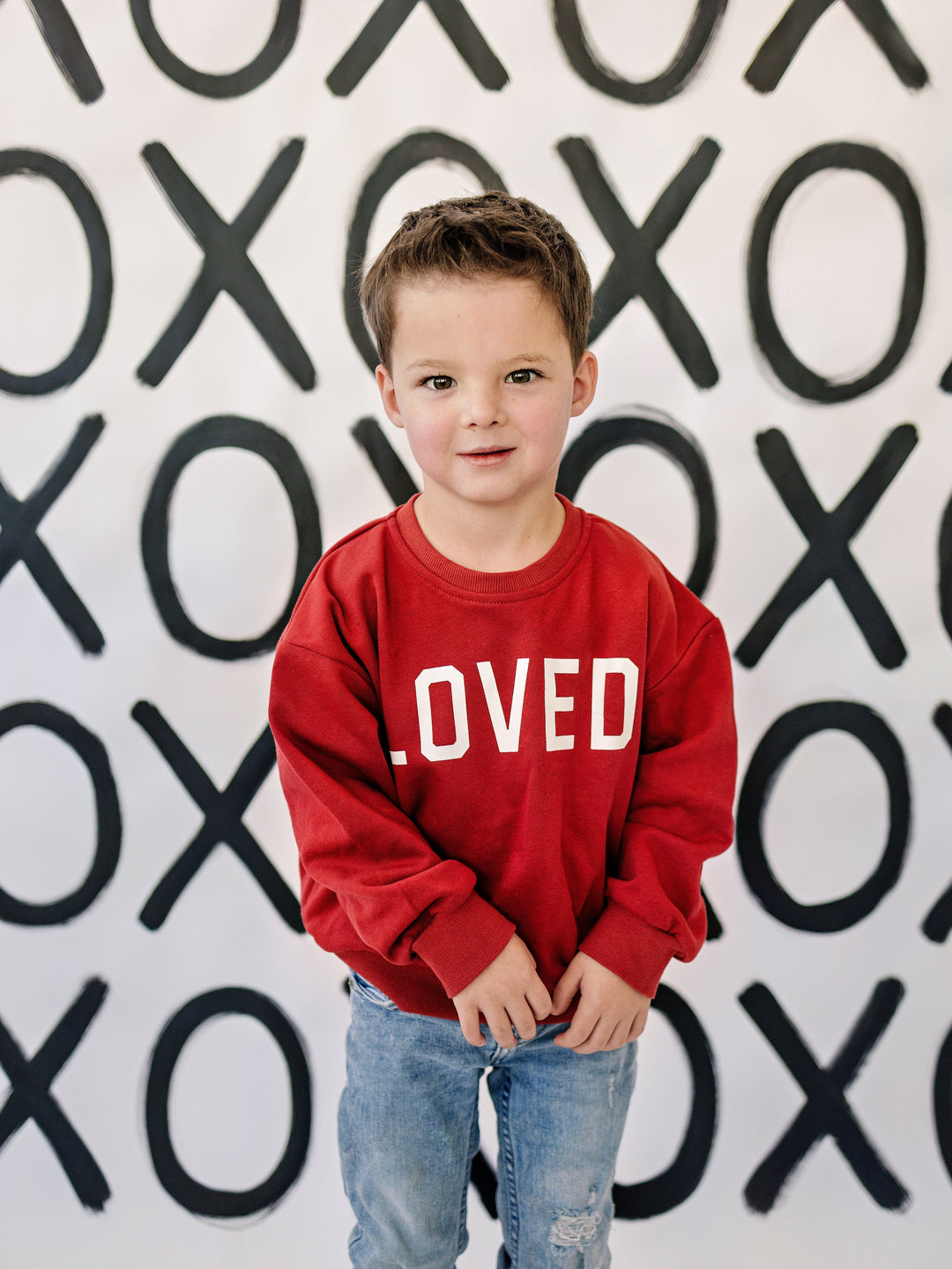 Red crewneck sweatshirt with &