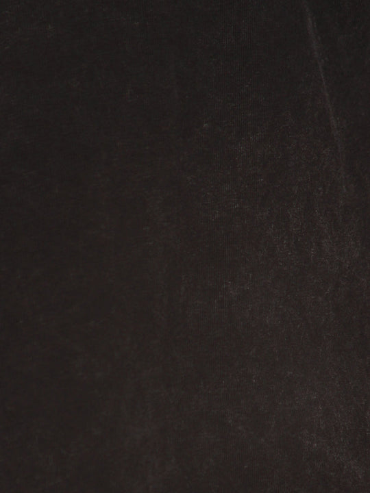 Close-up of distressed black fabric on long-sleeve pullover top